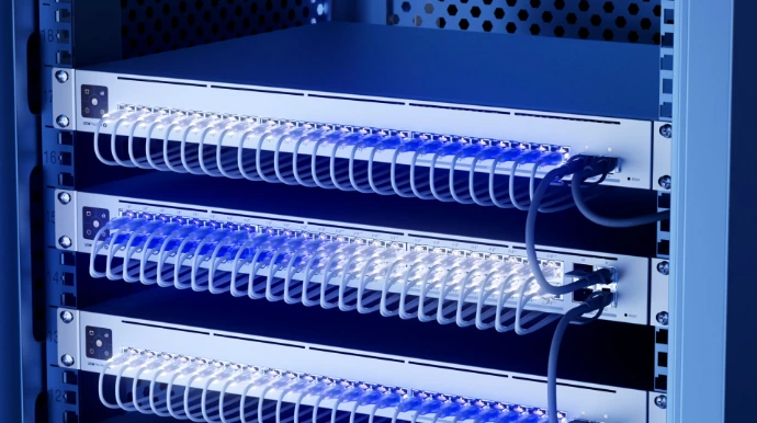 Network rack with patch panel and managed switching